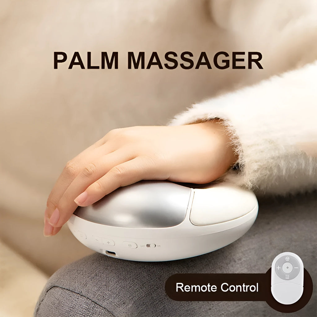 Smart electric hand massager with heat compress in pink and white on desk