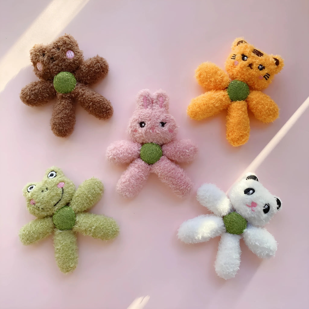 Catnip chewing ball toy for dental care in animal designs measuring 12.5cm by 11cm