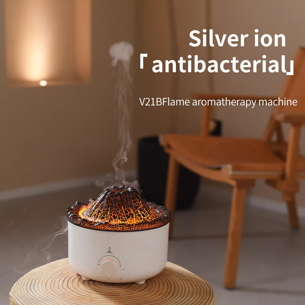 White volcano-shaped humidifier and essential oil diffuser with orange and blue simulated flame light effect.