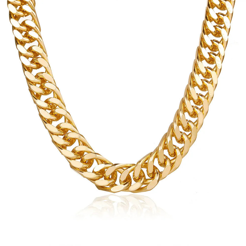 Women's gold tone thick chain necklace with a pendant on a white background.
