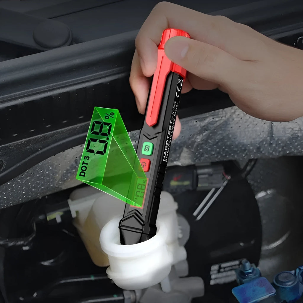 Digital display brake fluid tester pen with LCD screen on a workbench.