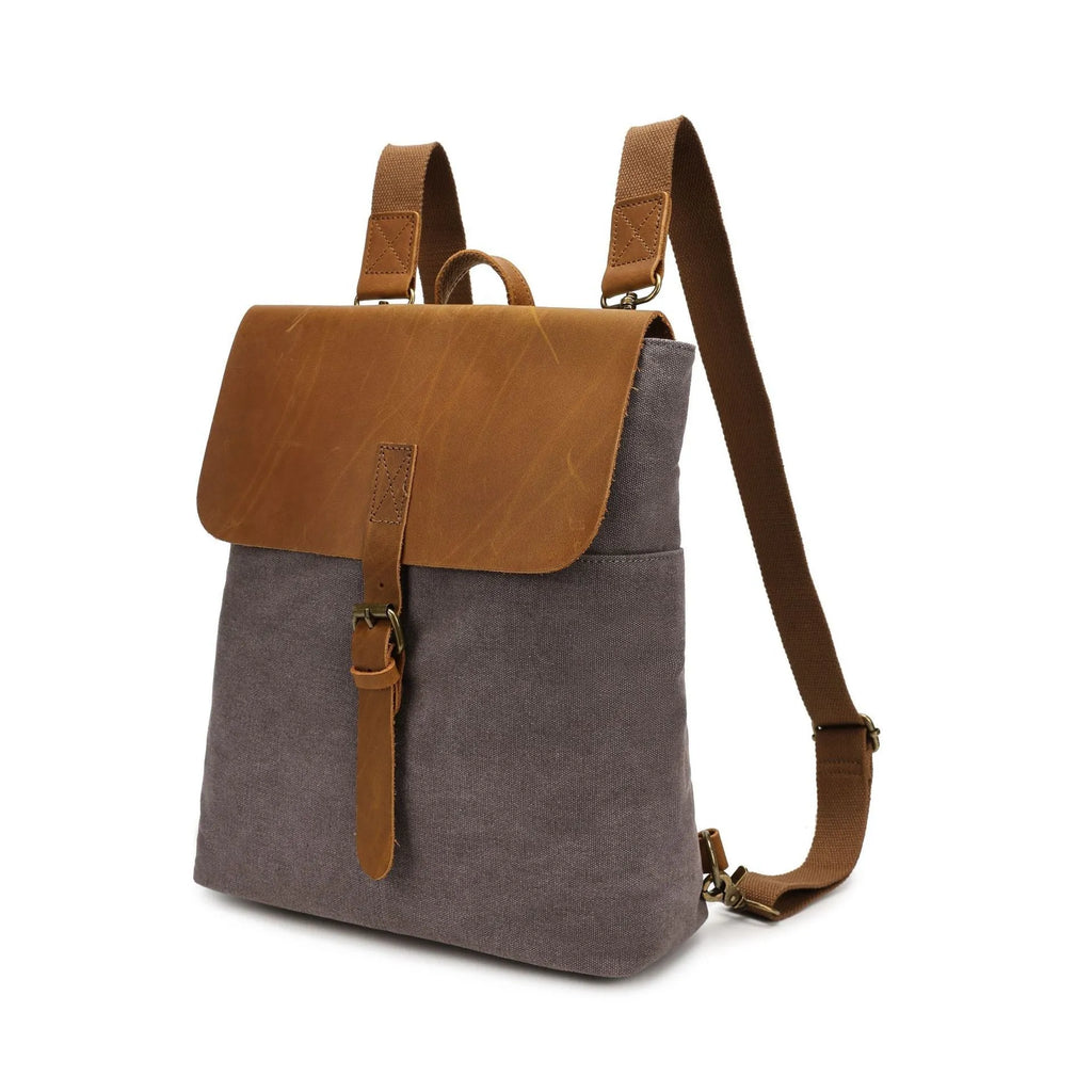 Waterproof canvas student backpack with Crazy Horse leather trim in minimalist design