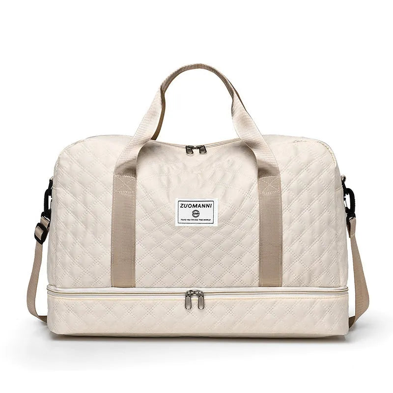 Large Oxford cloth travel holdall in a solid colour, shown with a capacity of 36-55 litres for buggies and luggage.