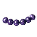 Purple charoite gemstone beaded bracelet with a platinum clasp.