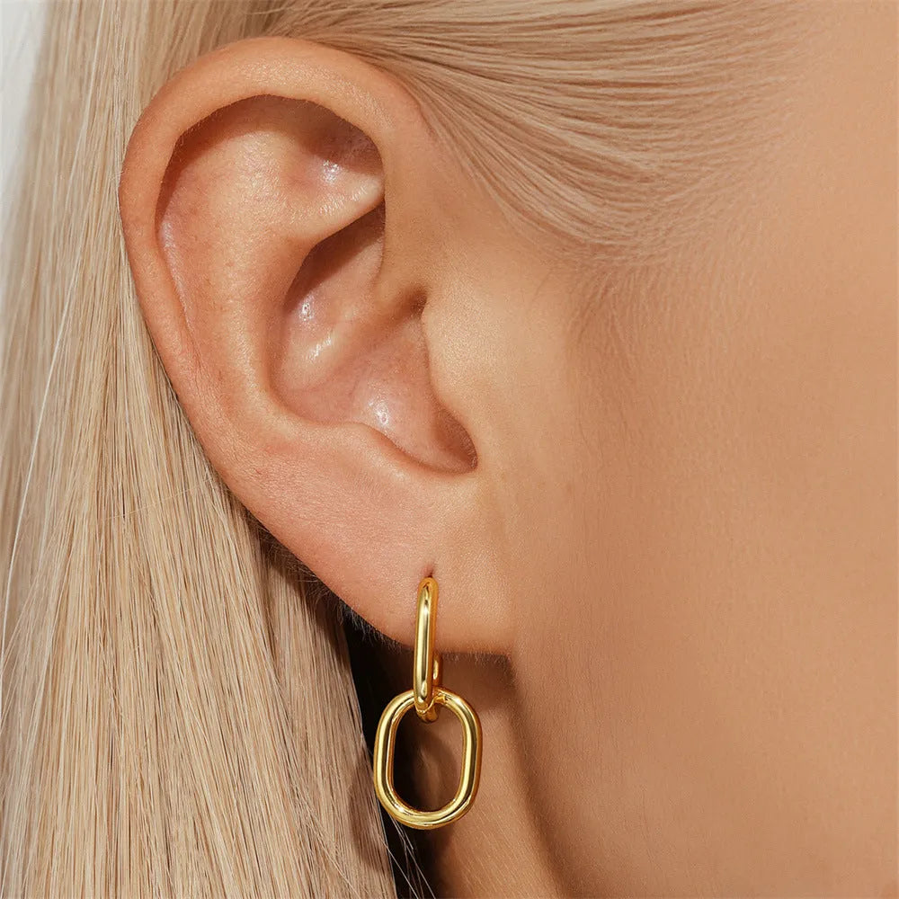 Golden brass diamond earclip earrings with geometric round design on copper base