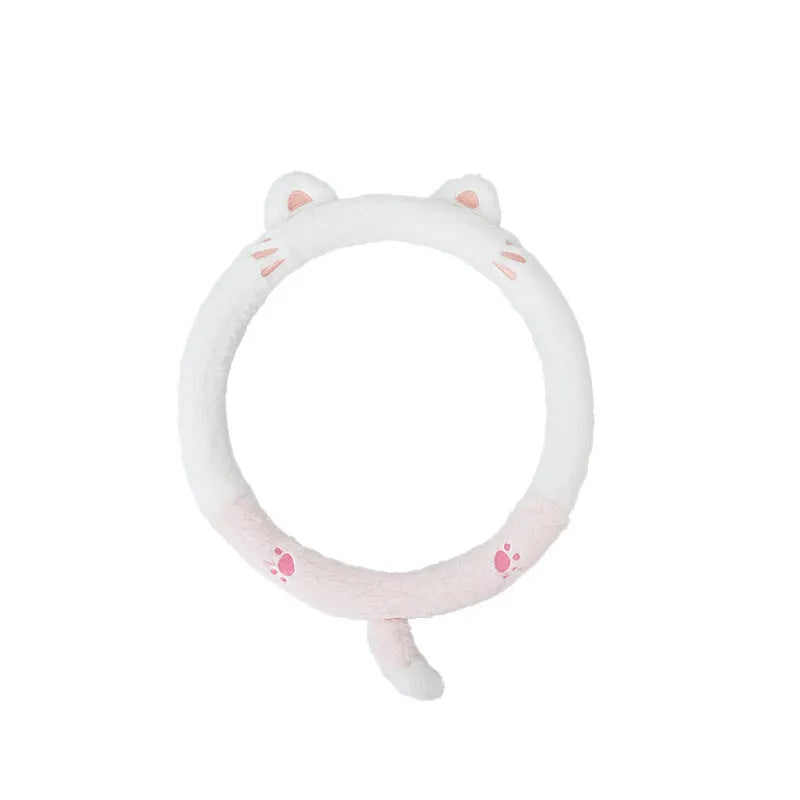 Plush winter steering wheel cover with embroidered cartoon animal, 38cm diameter.