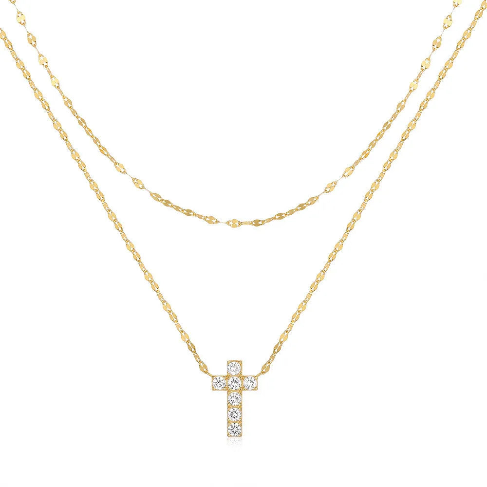 S925 sterling silver double layer geometric cross pendant necklace with twin diamond detail on a clavicle chain.
