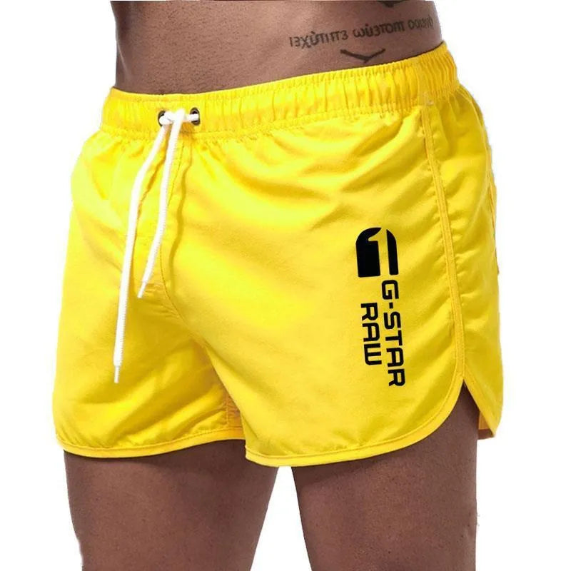 Men's thin hemp-blended polyester sport shorts in multiple colours on a mannequin, showing elastic waistband.