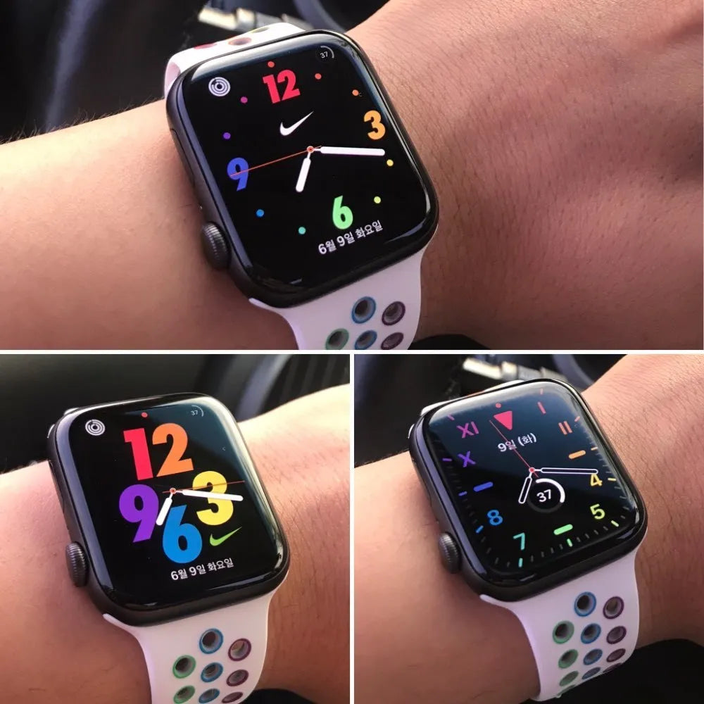 Silicone sports wristband with buckle strap in black, rainbow, or white colours.