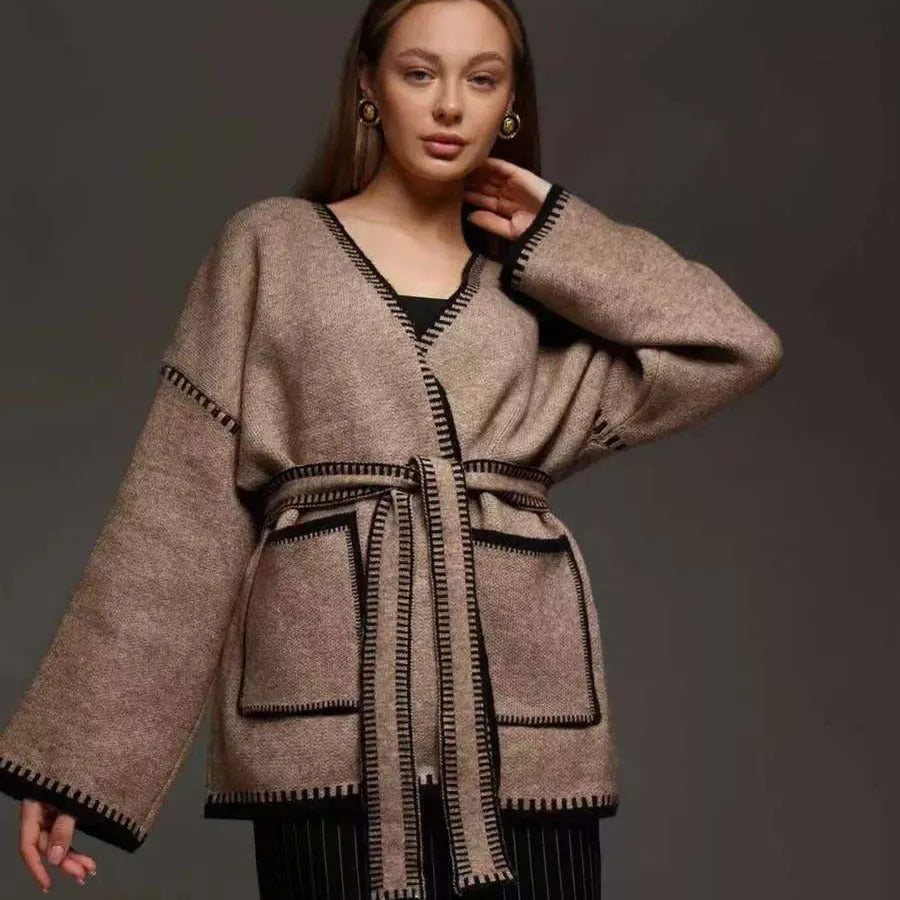Loose fit lace-up front knitted cardigan in black, camel, or white colours.