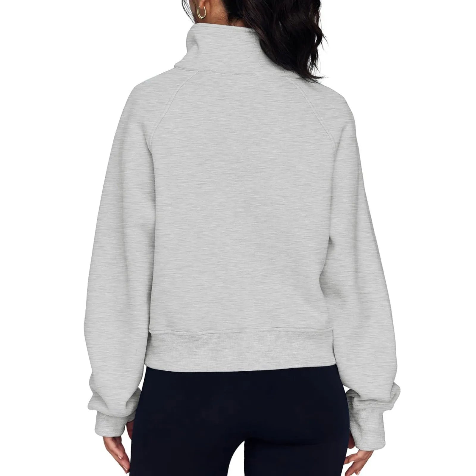 Women's loose lapel fleece-lined sweater in a solid colour showing raglan sleeve design.