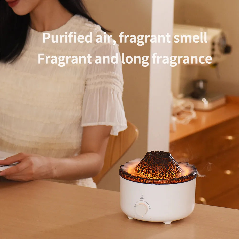 White volcano-shaped humidifier and essential oil diffuser with orange and blue simulated flame light effect.