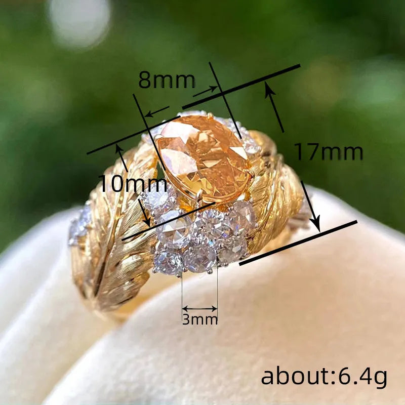 Women's feather embossed copper ring with geometric design and yellow zircon stone inlays