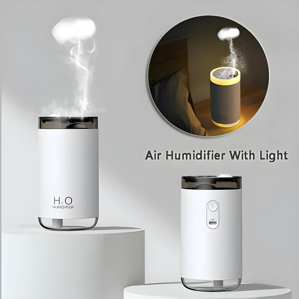 White portable USB humidifier with jellyfish mist spray and warm night light on wooden surface