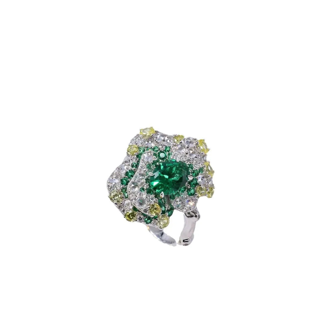 Secret Garden Series gradient emerald ring on a plain background showing the stone colour