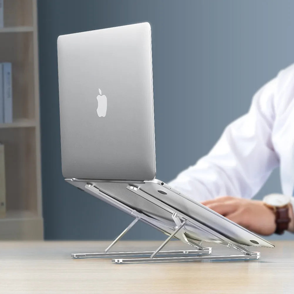 Foldable aluminium laptop stand in silver, shown open for use and folded for storage.