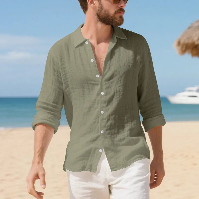 Man wearing a loose-fit light blue linen casual shirt with short sleeves
