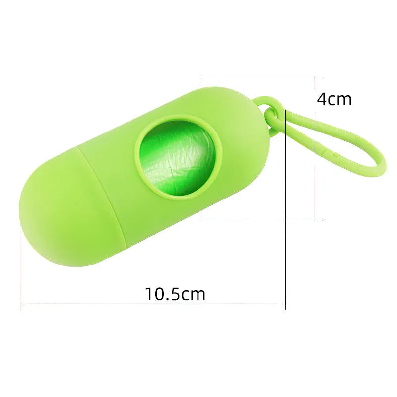 Black dog poop bag holder with side hook and Velcro closure, showing compact size.