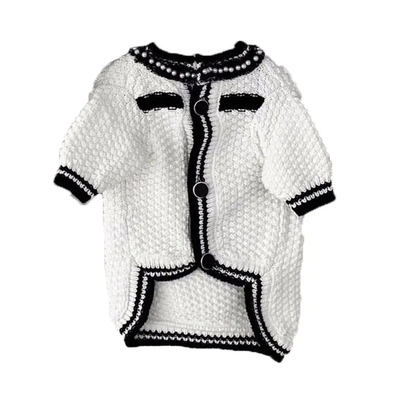White Korean style dog sweater with pearl detail collar on a small dog, showing princess style pet clothing.