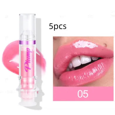 Lip gloss tube with mirror finish showing shiny application on lips
