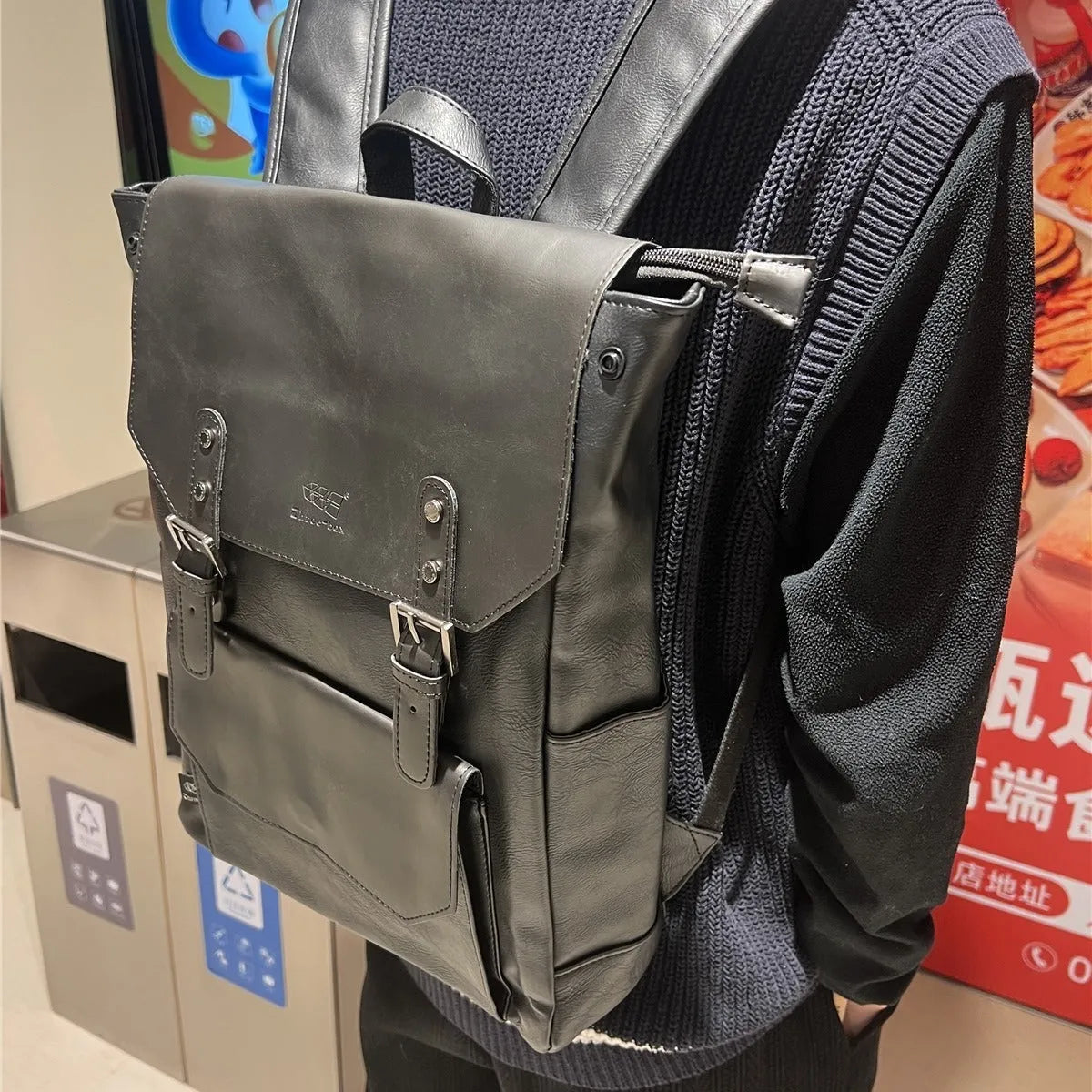 Unisex large capacity backpack in breathable PU material suitable for business travel and college use