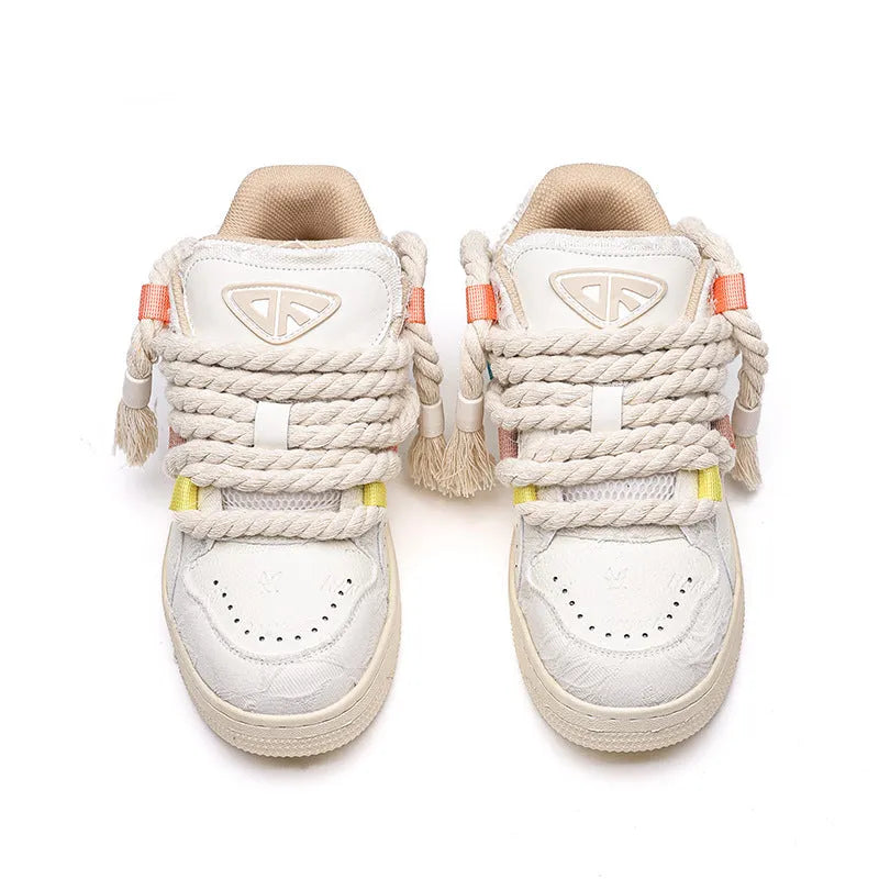 Creamy white retro skateboard shoes with lace-up front and platform rubber soles