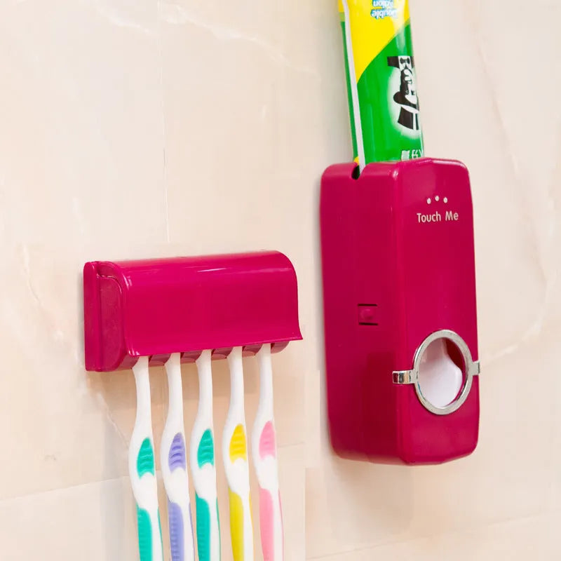 White wall-mounted bathroom set with a toothbrush holder and a pump-action toothpaste dispenser.