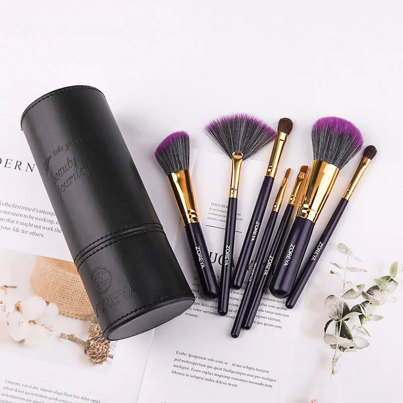 Daily makeup brush set with artificial fibre bristles and aluminium handles in black, brown, and pink