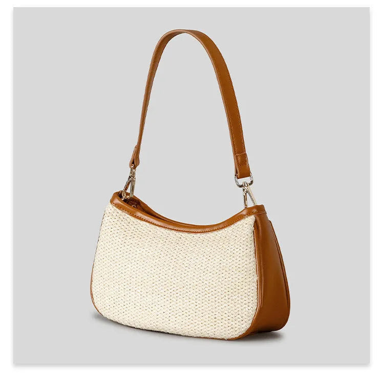 Khaki hand-woven straw crossbody bag with a single strap and contrasting detail.