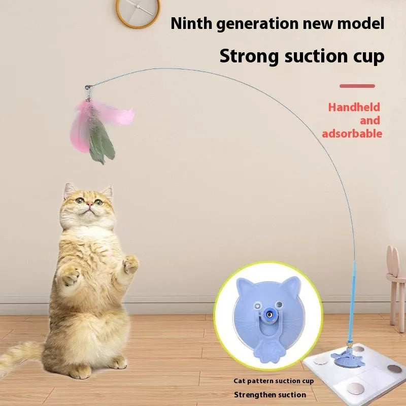 Interactive cat teaser toy with suction cup base, long handle, and dangling brush with bell attachment