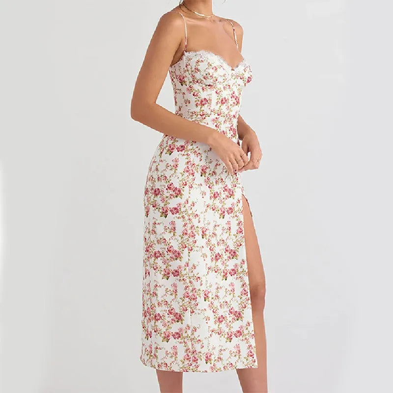 Women's long lace floral print dress with front slit and suspender straps in blue.