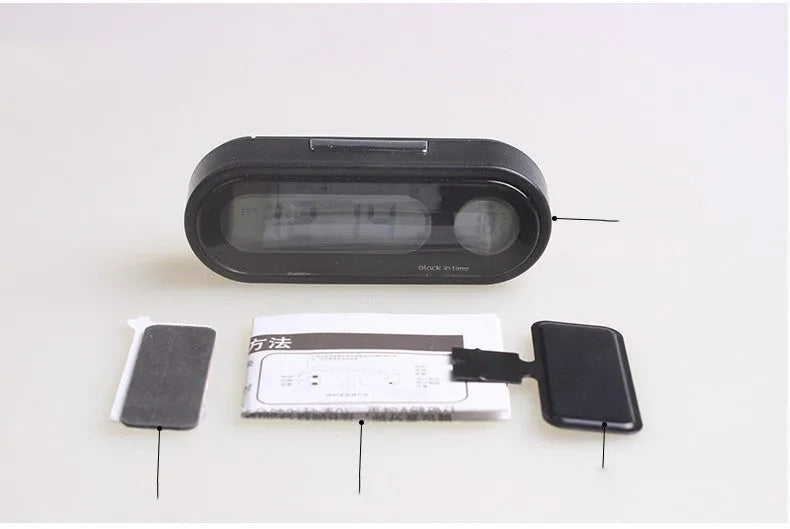 Black car digital clock and thermometer with LED display on adjustable bracket.