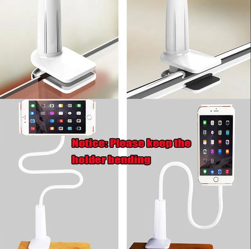 Black bedside oversize flat panel phone holder with long flexible arm mounted on a wooden table.