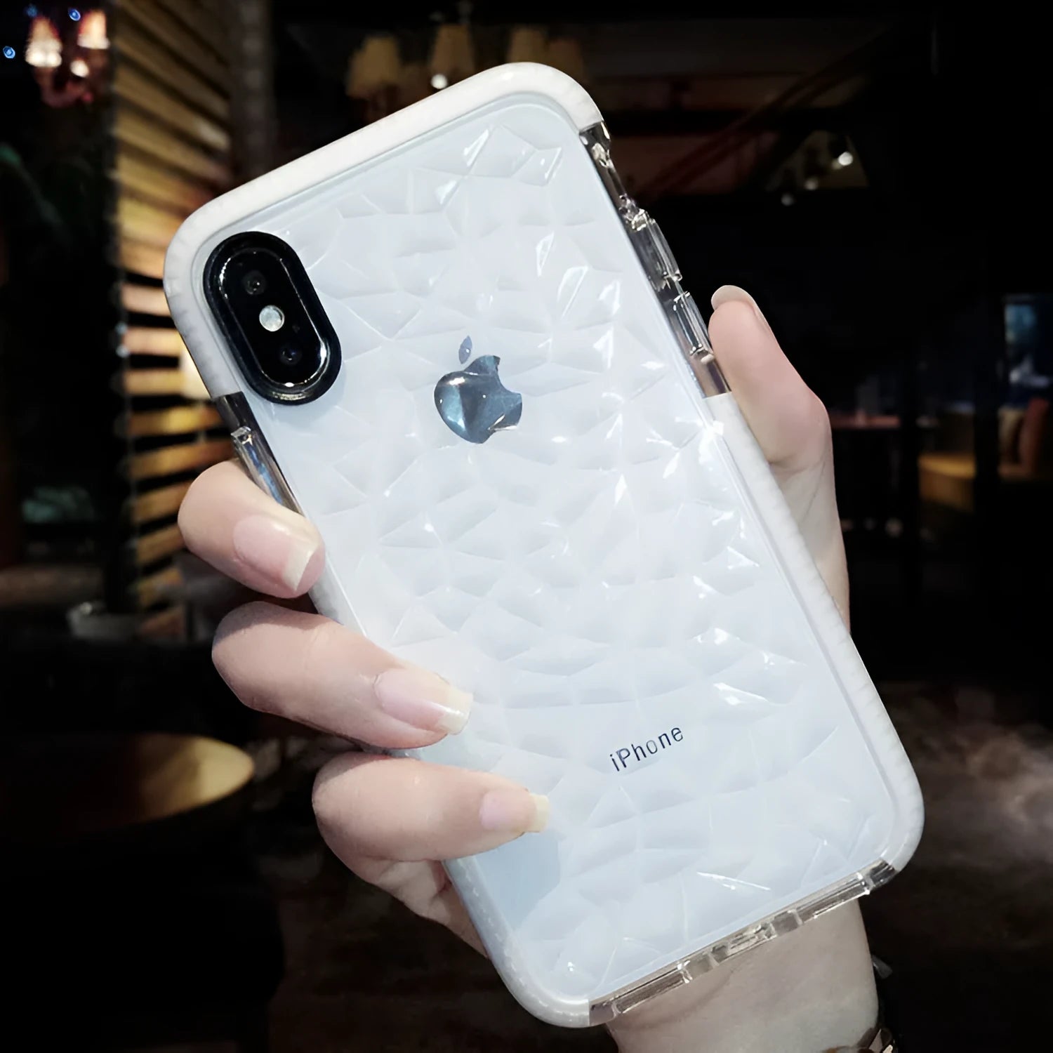 Slim TPU iPhone case with a coloured striped edge, shown on an iPhone.