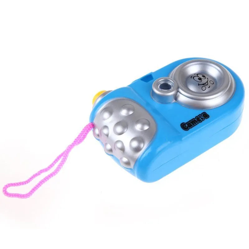 Children's plastic projection camera toy showing animal images including dinosaurs and dolphins