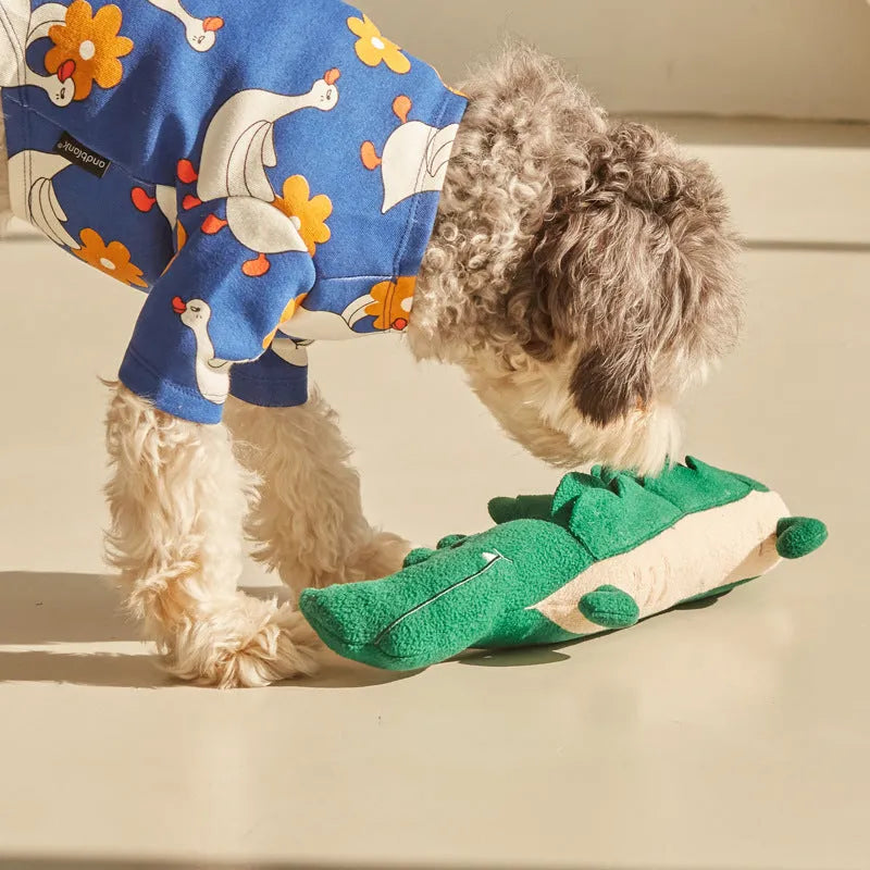 Green durable interactive plush toy dog, 35cm long, for children's play.