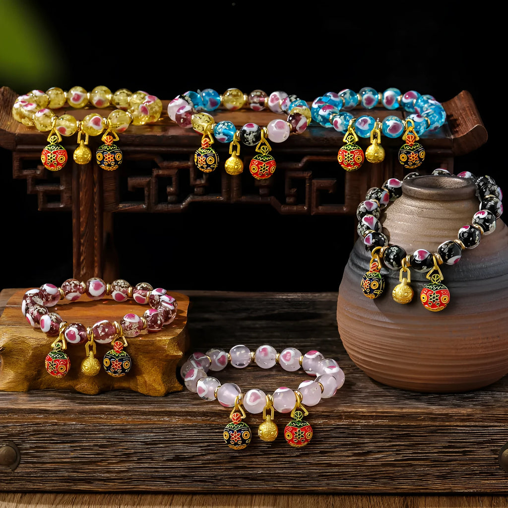 Handmade heart-shaped glass bracelet with swallowing gold beast pattern in ancient fluorescent glaze
