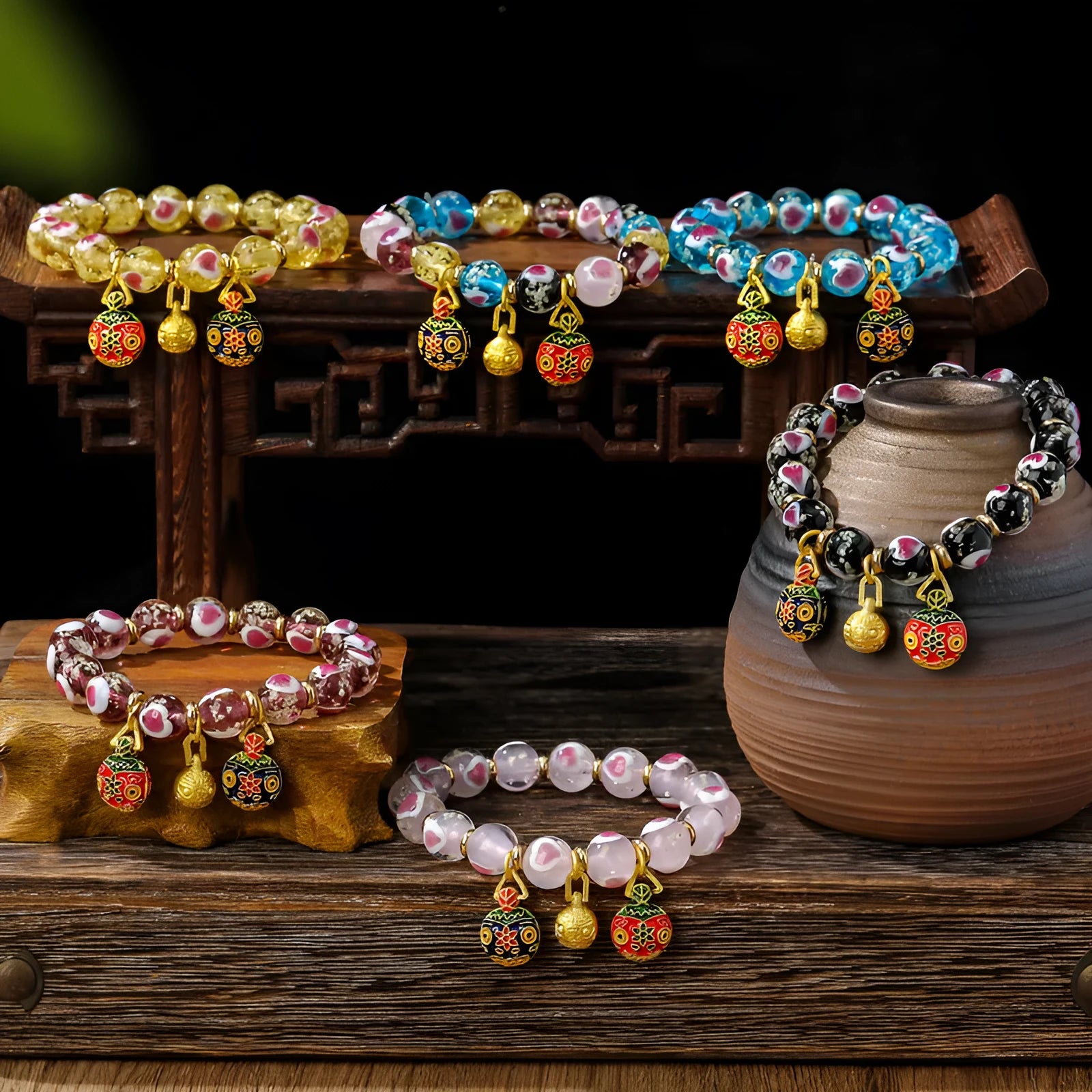 Handmade heart-shaped glass bracelet with swallowing gold beast pattern in ancient fluorescent glaze