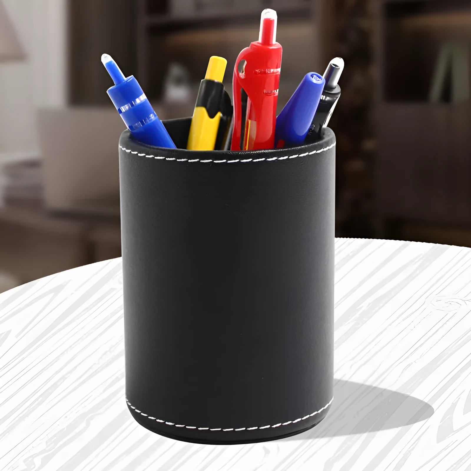 Round black leather pen container with 8.0cm diameter and 10.8cm height dimensions