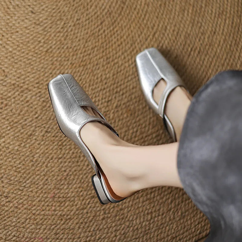 British style square head leisure slippers in black colour with artificial PU upper and low heel design