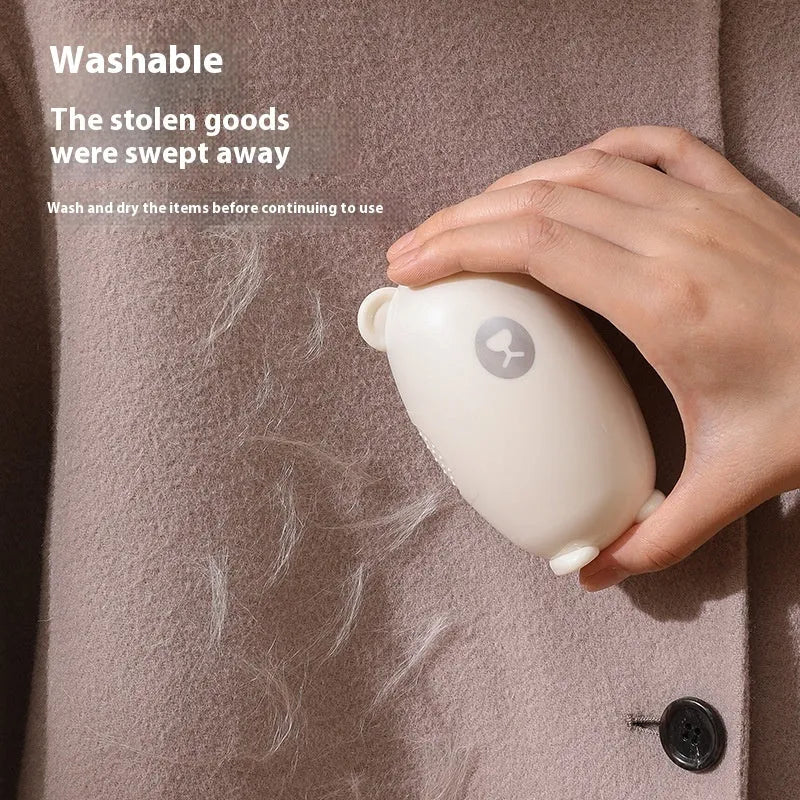 Washable lint remover roller in green pink or white colours with adhesive hair removal surface