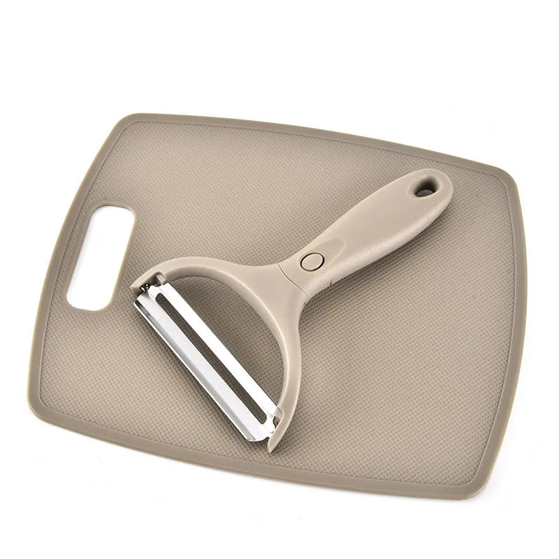 Green eight-piece multi-function kitchen planer set with disassemblable components on a PP base.