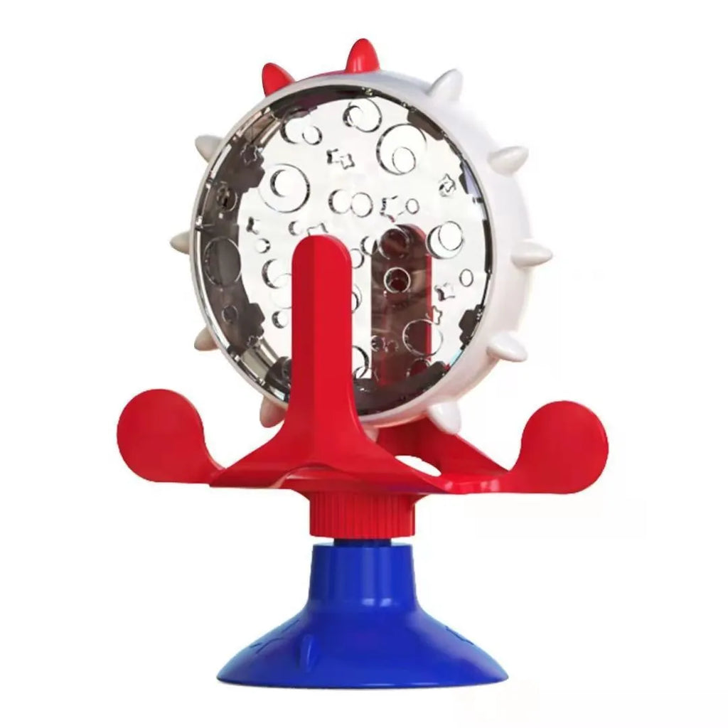 Interactive pet puzzle toy with spinner and sucker base in blue, green, red or yellow for cats and small dogs.