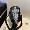Halloween graffiti print mini crossbody bag with cartoon pumpkin ghost bat design in multiple colours.