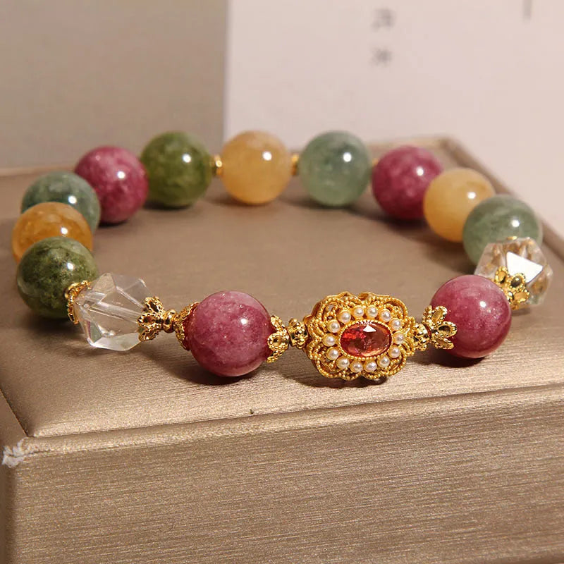Women's alloy bracelet with colour tourmaline round beads on a pearl crystal base and rhinestone details.