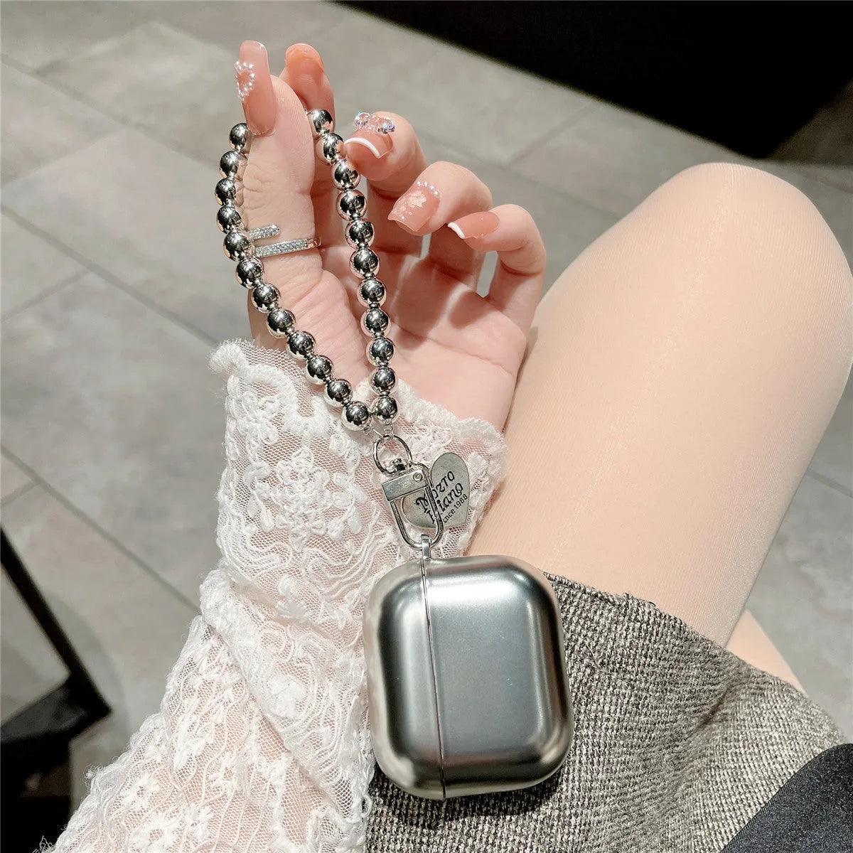 Matte plating AirPods protective case showing electroplating finish on TPU material