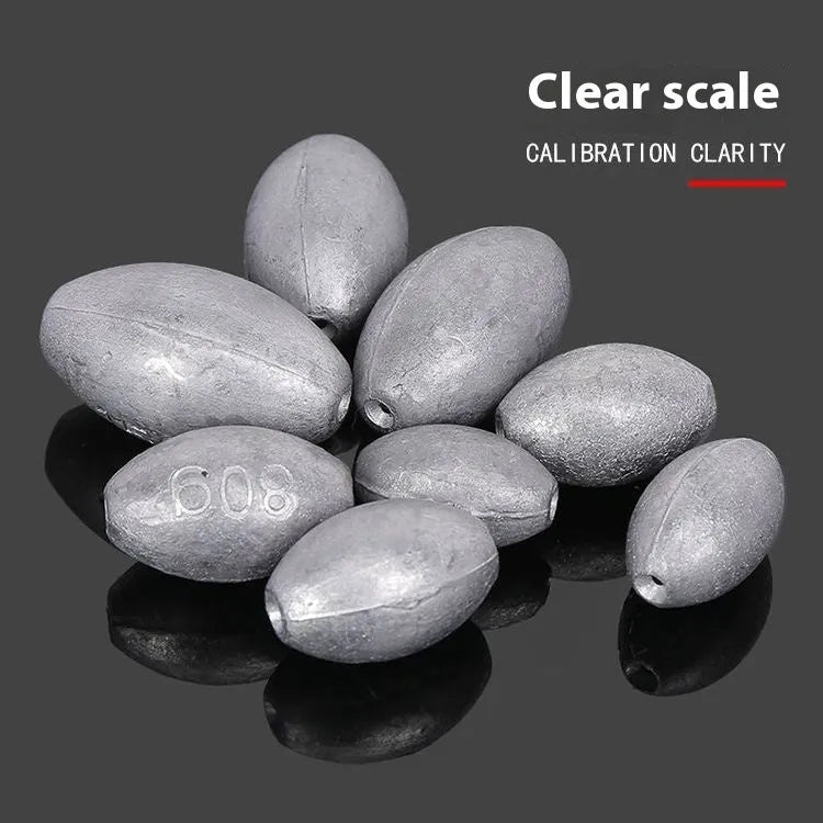 Tongxin olive lead fishing sinker with scale markings, showing rugby shape and plastic core.