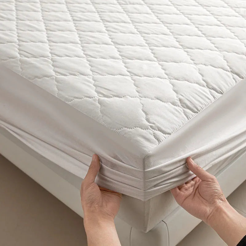 Diamond lattice quilted waterproof mattress protector fitted sheet in bamboo fibre.