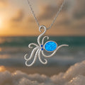 Silver geometric octopus opal pendant necklace on a stainless steel box chain.