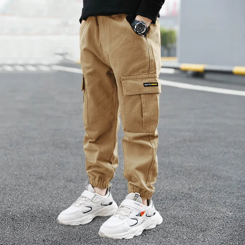 Boys' casual cotton summer trousers in khaki, shown in size for child over 140cm.